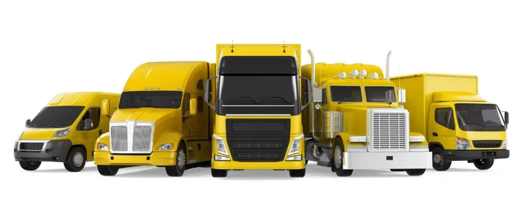 Yellow commercial fleet vehicles including vans and semi trucks at Express Lube & Car Care in Arlington Texas