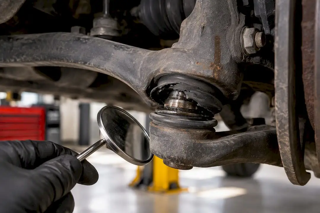 Torn dust boot on a ball joint