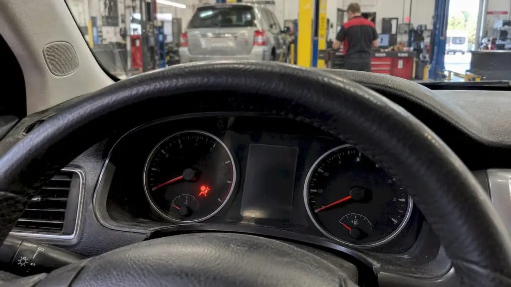 Airbag warning icon illuminated on dashboard